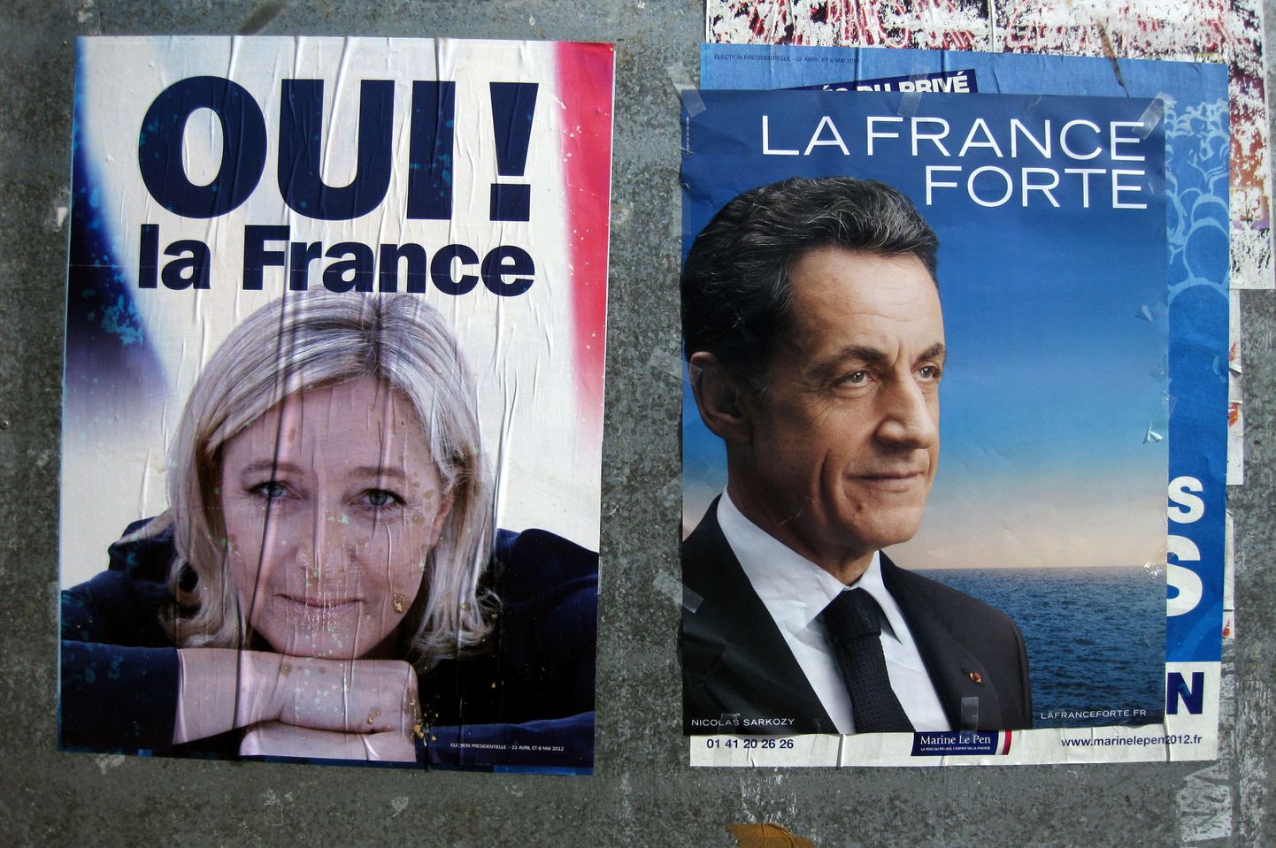 Marine Le Pen ja Nicolas Sarkozy valimisplakateil.