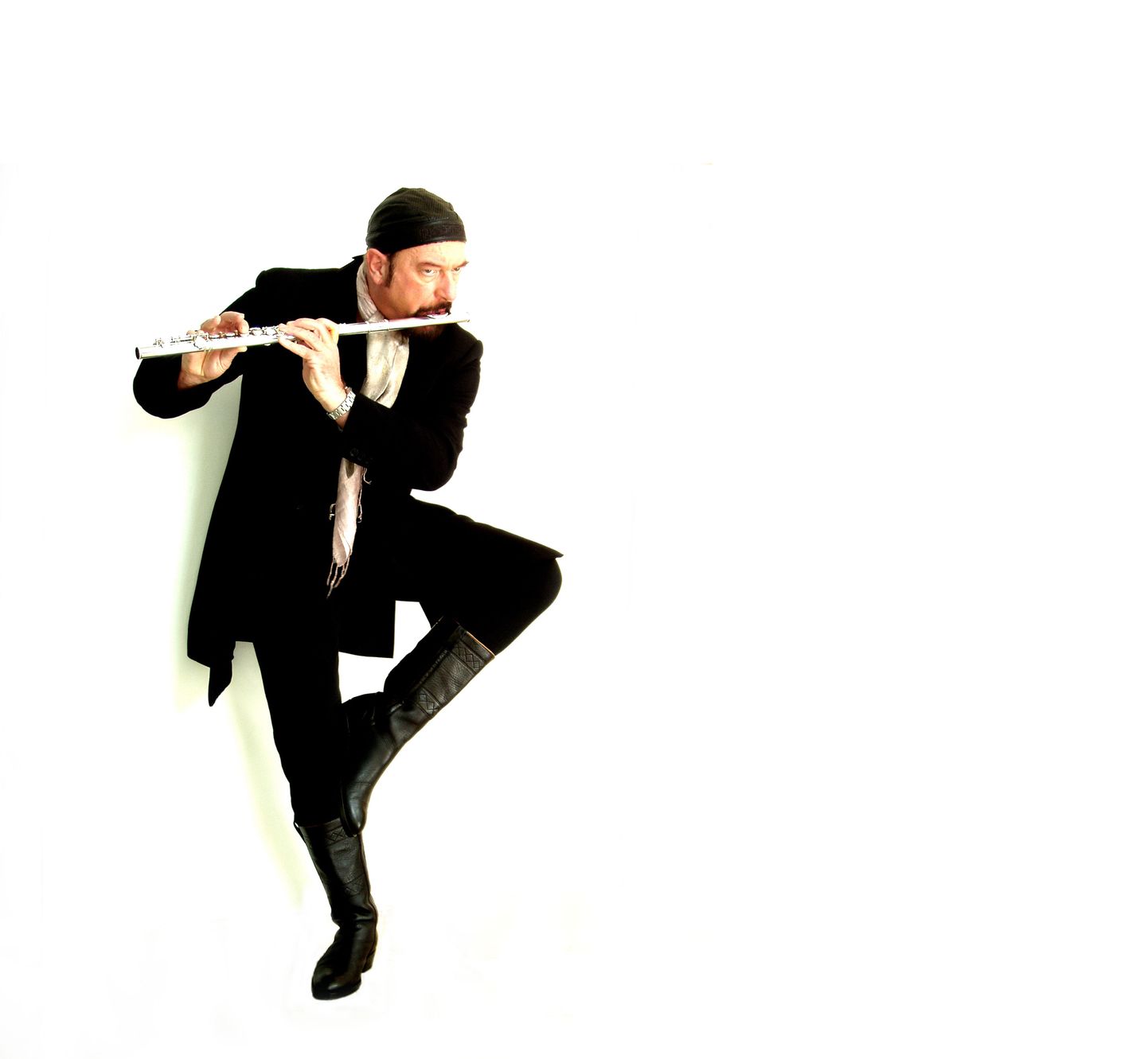 Когда Йен Андерсон берет в руки флейту, он становится похож на бога Кришну.
