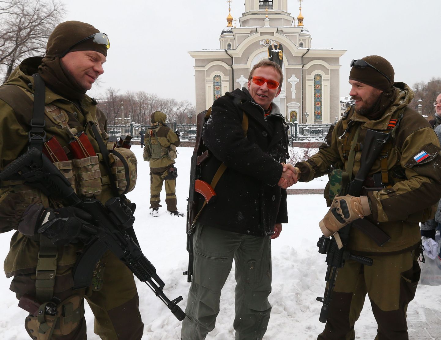 DONETSK, UKRAINE. NOVEMBER 30, 2014. Actor Ivan Okhlobystin (C) talking with militia members at the Church of the Transfiguration. Valery Sharifulin/TASS
