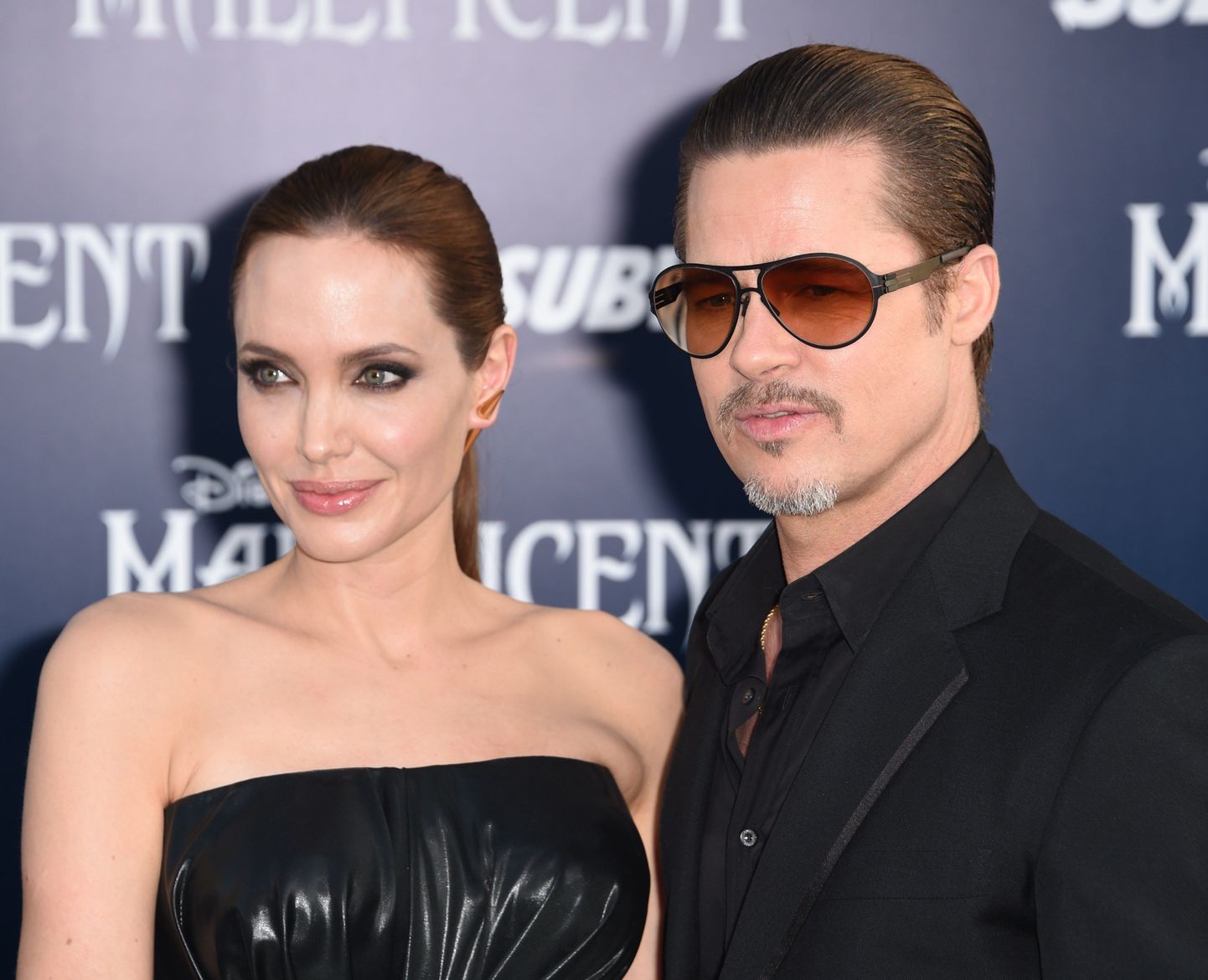 Анджелина Джоли и Брэд Питт на премьере фильма «Малефисента».
