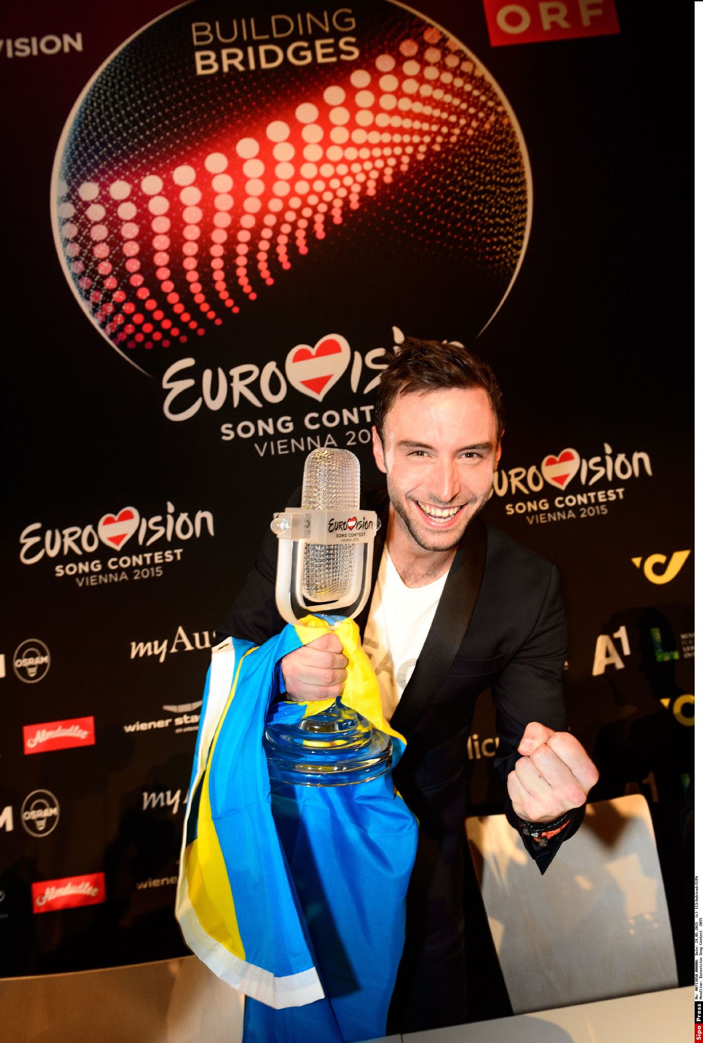 Swedish singer Mans Zelmerlow  after winning the Eurovision Song Contest final in Vienna, Austria, May 24, 2015.
Swedish singer Mans Zelmerlow won the 60th edition of annual Eurovision Song Contest here on Sunday. Zelmerlow, a 28-year-old pop singer and television host, represented Sweden in the contest with the song "Heroes" and won the final with 365 points, awarded by a combination of a jury and a public vote/BABIRAD_1737.06/Credit:113/babirad/SIPA/1505241748