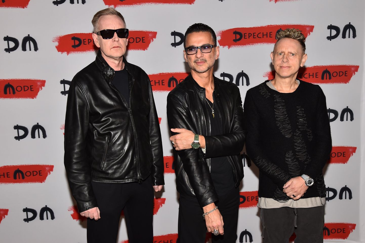 Members of rock band Depeche Mode (from left) Andrew Fletcher, Dave Gahan and Martin Gore pose during a press conference to promote their new album "Spirit" on October 11, 2016 in Milan.  / AFP PHOTO / GIUSEPPE CACACE