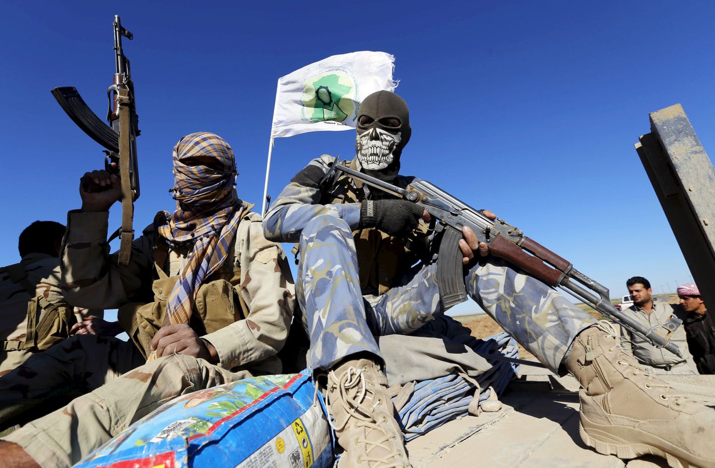 Maskeeritud šiiidi võitlejad Iraagis.