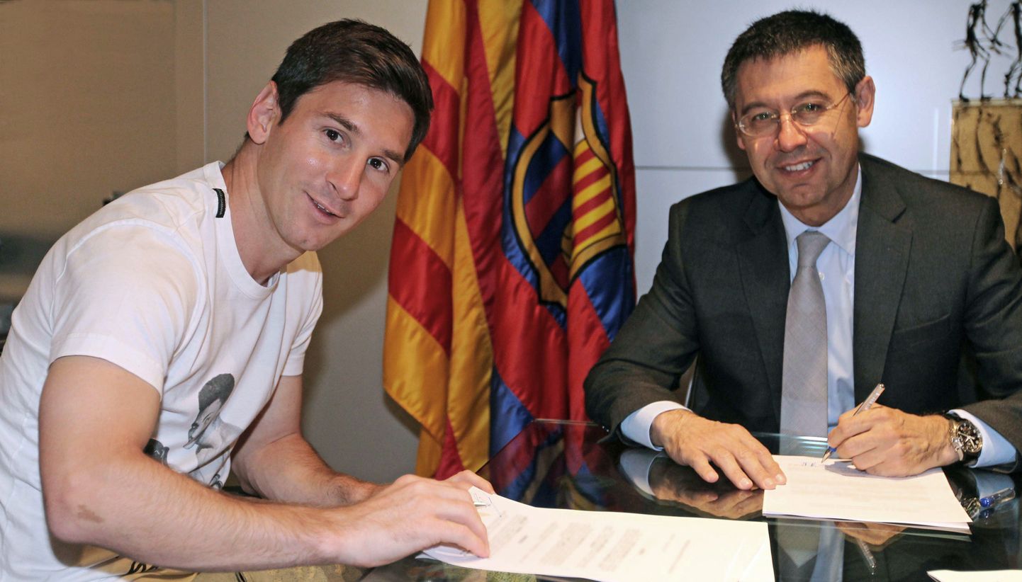 Lionel Messi (vasakul) allkirjastas FC Barcelonaga uue lepingu.