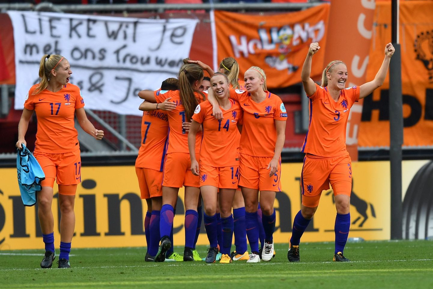 Netherlands' forward Vivianne Miedema (unseen) celebrates with teammates after scoring a goal during the UEFA Women
