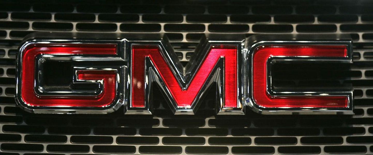Эмблема Motors Company (GMC).