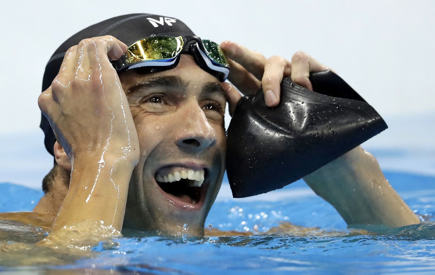 Michael Phelps pärast 100 meetri liblikaujumise finaali.