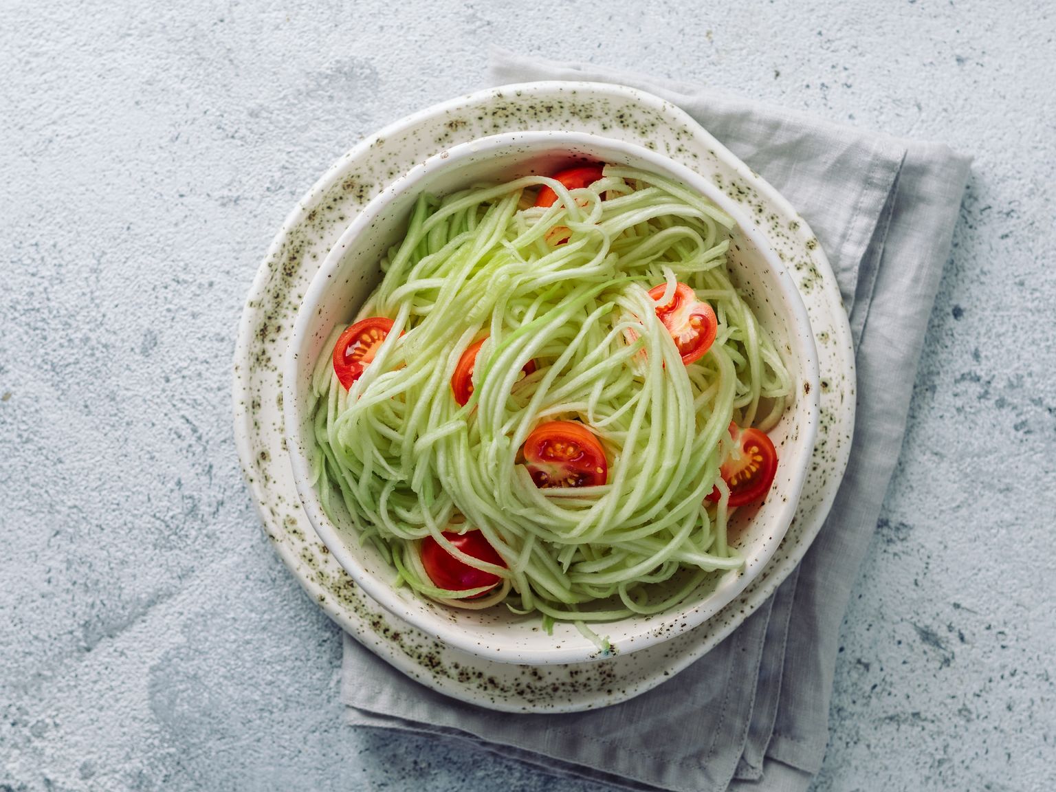 Zucchini noodles salad. Top view, copy space