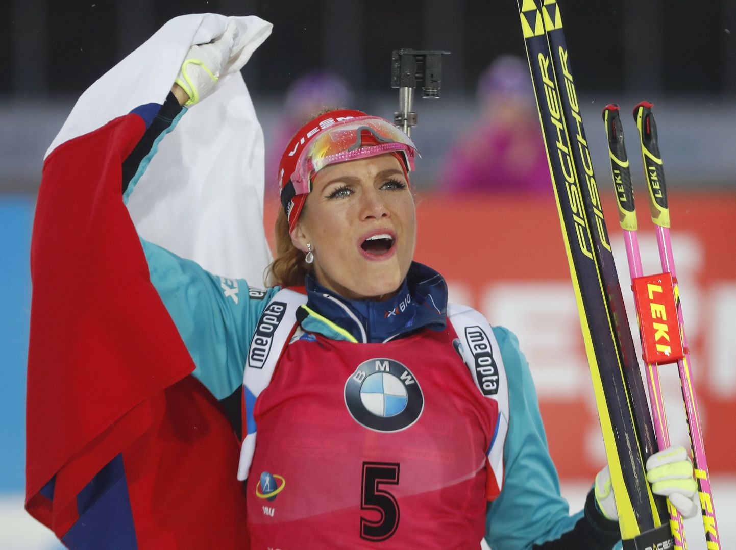 Czech Republic's Gabriela Koukalova celebrates after winning the women's Biathlon World Cup 12.5 km mass start event in Nove Mesto na Morave, Czech Republic, Sunday, Dec. 18, 2016. (AP Photo/Petr David Josek)