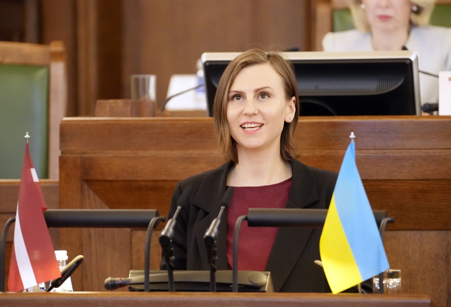 14. Saeimas deputāte Leila Rasima nodod zvērestu jeb svinīgo solījumu 14. Saeimas pirmās sēdes laikā.