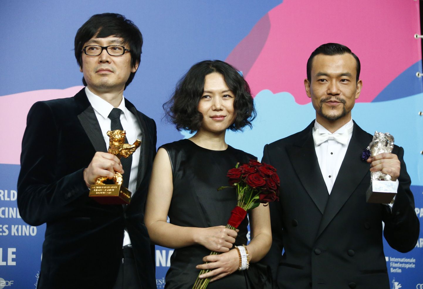 Diao Yinan (vasakul) koos Liao Fan'i (paremal) ja Vivian Qu'ga (keskel)