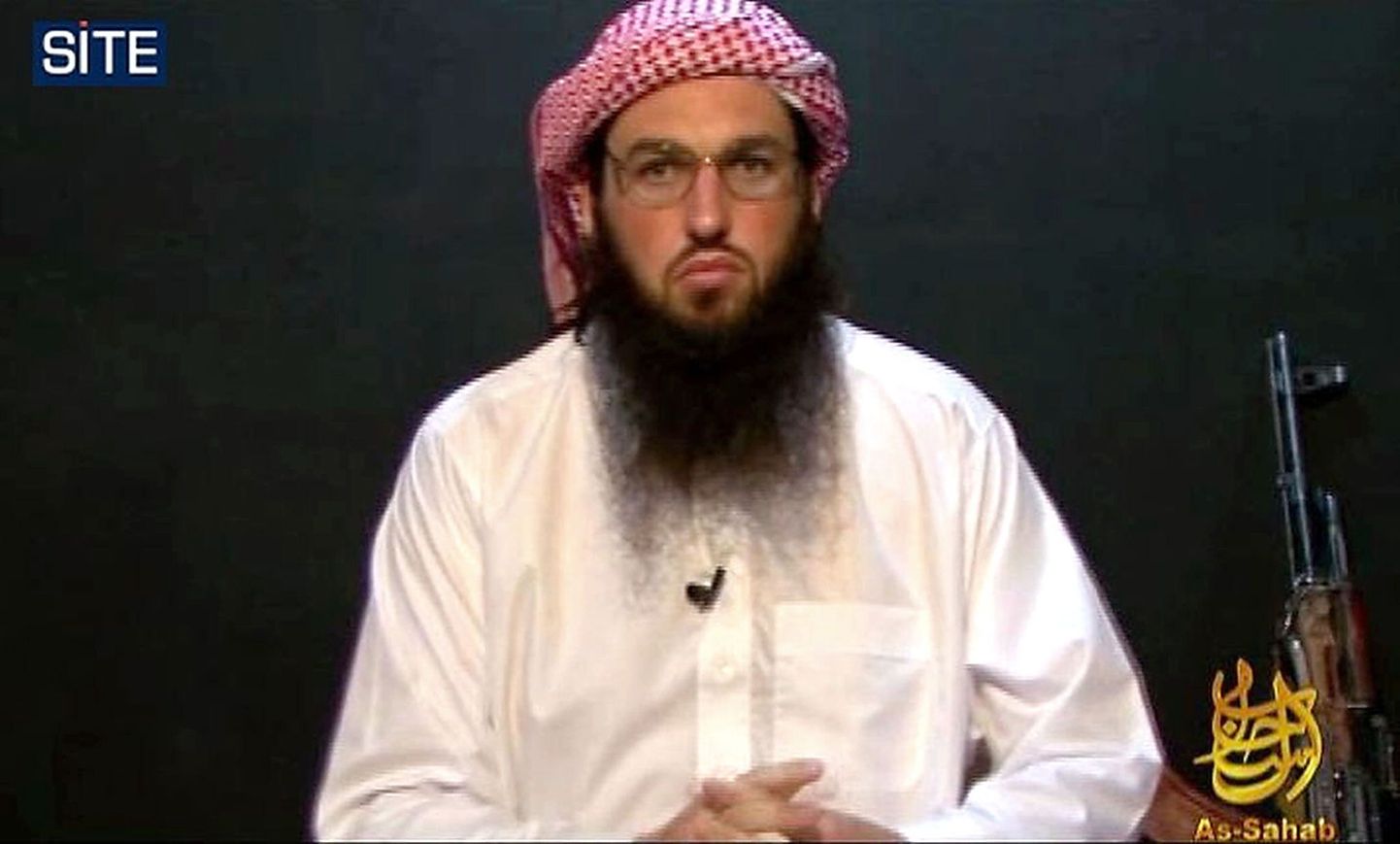 A still image released by the Site Intelligence Group on October 23, 2010 shows Al-Qaeda's American spokesman Adam Gadahn delivering a video message, produced by Al-Qaeda's media arm As-Sahab, in which he urges fellow Muslims in the West to carry out attacks in the "Zio-Crusader coalition" states, SITE Intelligence Group said. AFP PHOTO/HO/SITE INTELLIGENCE GROUP == RESTRICTED TO EDITORIAL USE ==