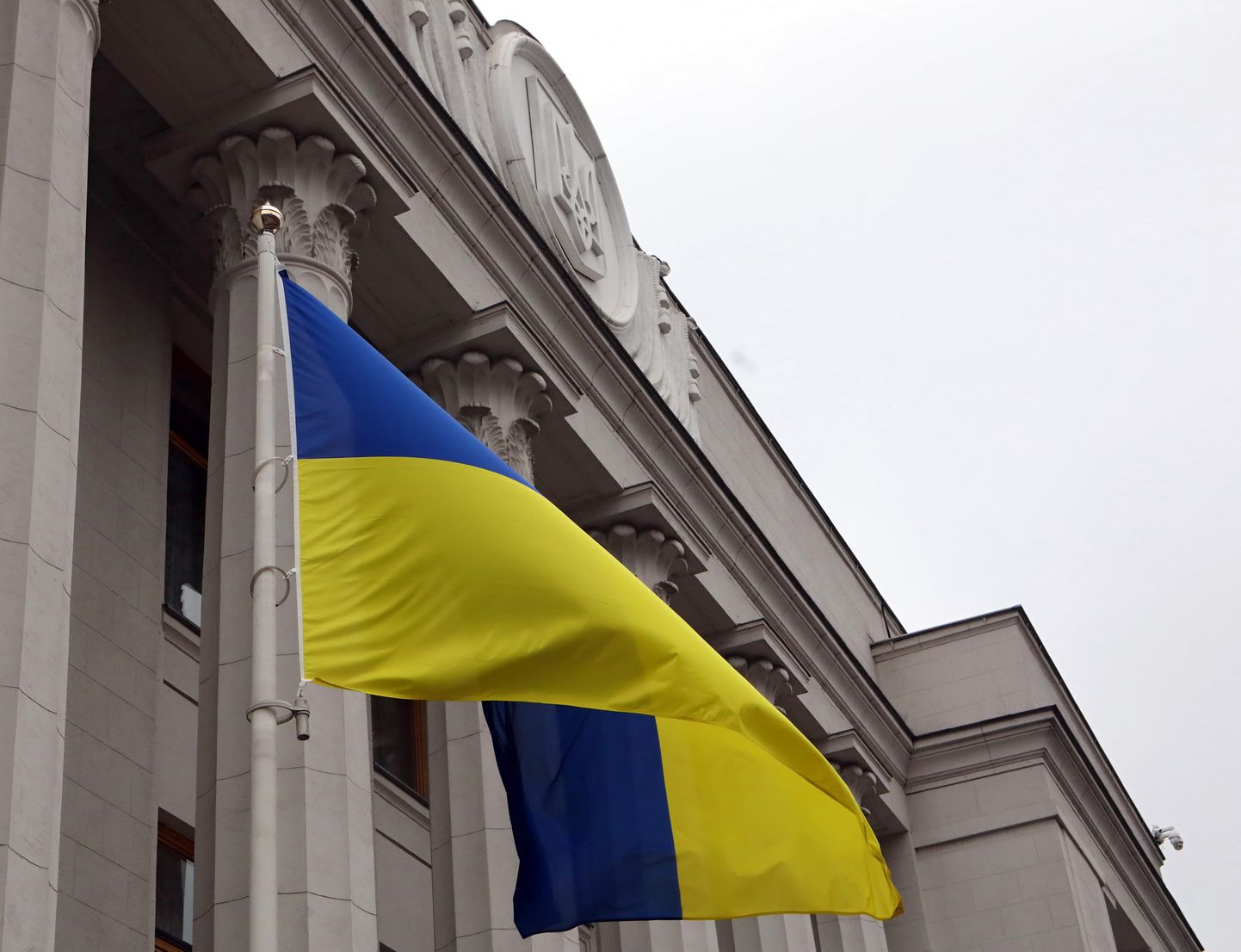 January 22, 2020, Kyiv, Ukraine: KYIV, UKRAINE - JANUARY 22, 2020 - The State Flag of Ukraine flies outside the Verkhovna Rada building on the Unity Day, Kyiv, capital of Ukraine. On this day, the country marks the 101st anniversary since the proclamation of the unification of the Ukrainian People's Republic (UPR) and the Western Ukrainian People's Republic (WUPR) which took place in Kyiv's Sofiiska Square on January 22, 1919. (Credit Image: © Volodymyr Tarasov/Ukrinform via ZUMA Wire)