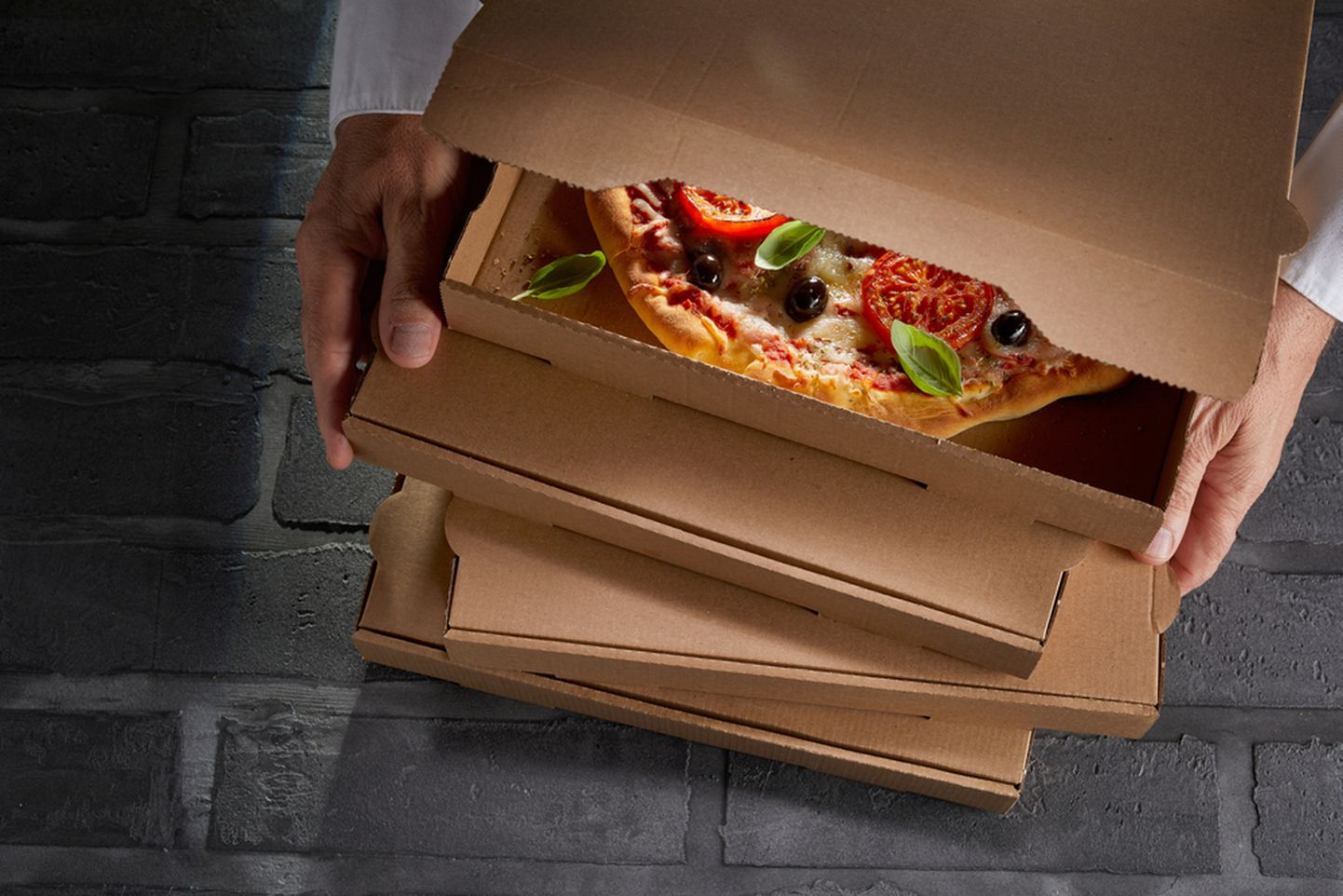 Коробка для пиццы. Иллюстративное фото.