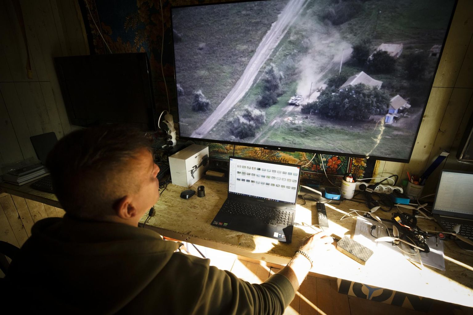 At the Madjar Birds headquarters, several pairs of eyes monitor the situation on the half-hundred-kilometer section of the southern front around the clock. One of the members of the unit shows to Postimees epic footage of how the combat mission is completed - an explosive charge on a careless Russian tank team machine sends the self-confident orc sitting on the dome flying into the sky.