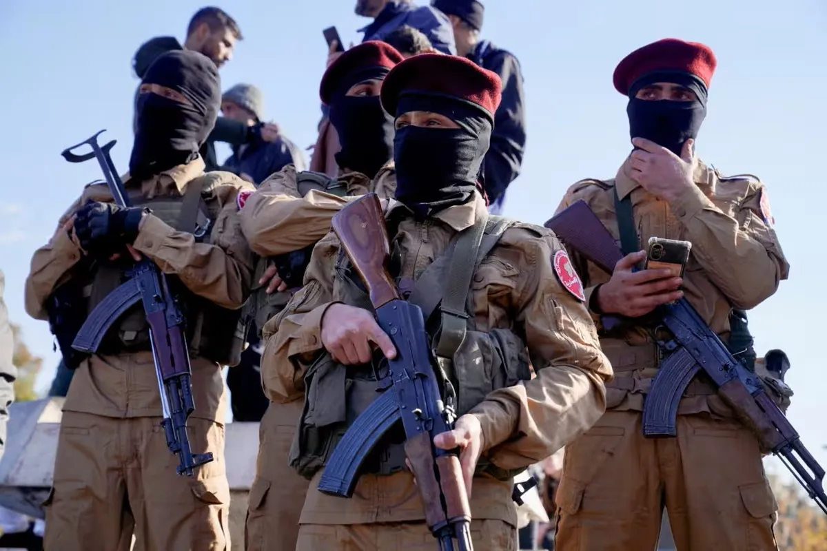 Turkey-backed Syrian National Army fighters in Aleppo following the fall of Bashar al-Assad.