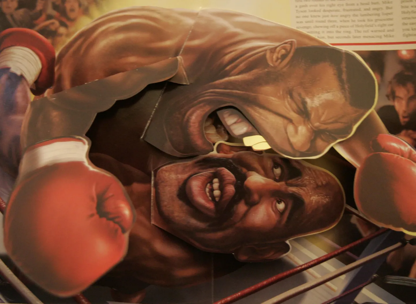 Karikatuur 1997. aasta matšist, kus Mike Tyson hammustas Evander Holyfieldi kõrvast.