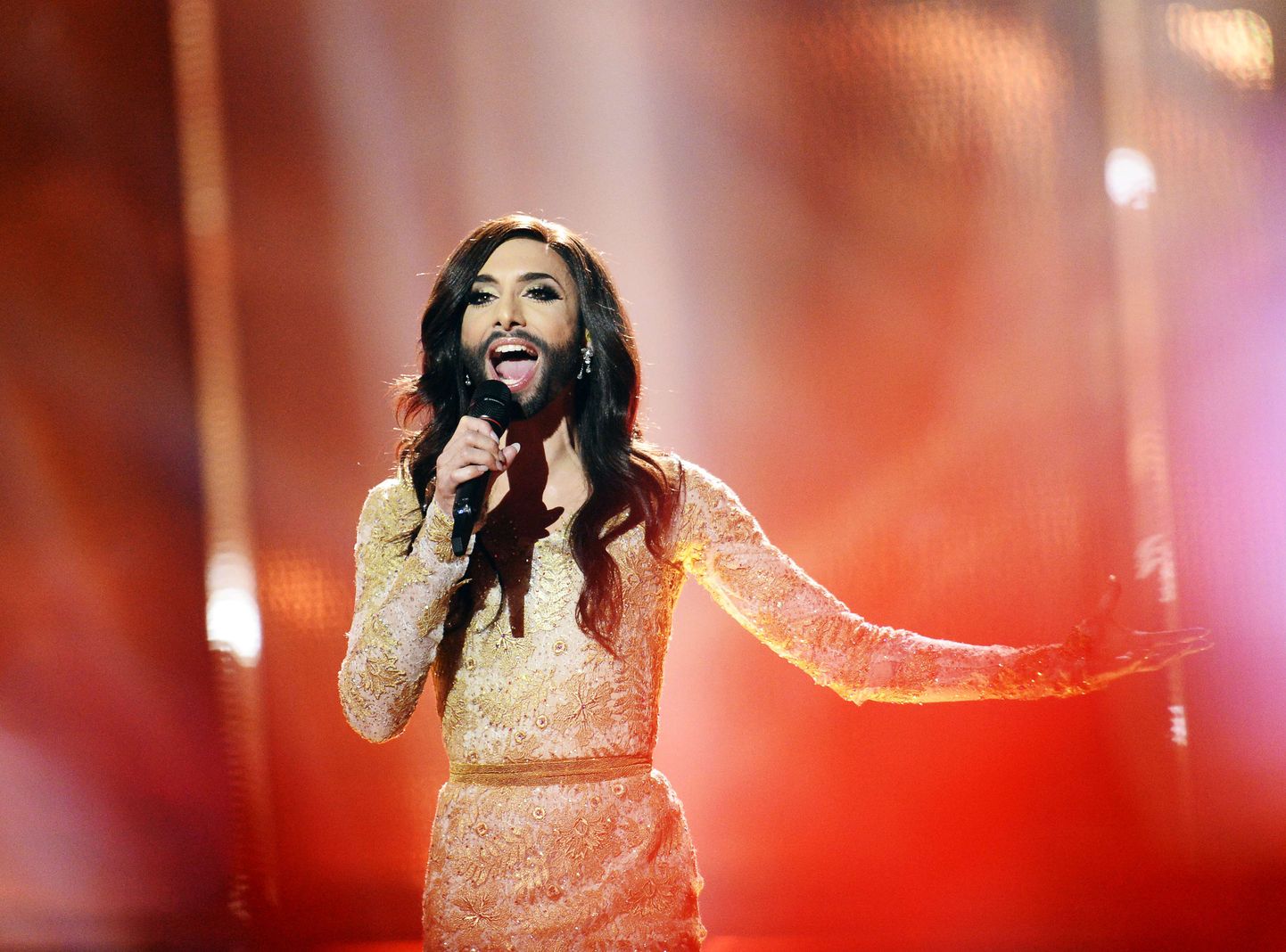 Conchita Wurst representing Austria performs the song "Rise Like A Phoenix" during the dress rehearsal for the Eurovision Song Contest 2014 Grand Final in Copenhagen, Denmark, on May 9, 2014. AFP PHOTO/JONATHAN NACKSTRAND