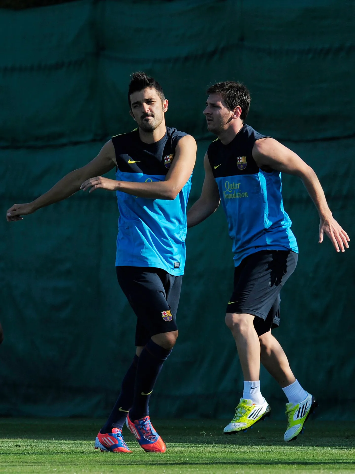 Lionel Messi (paremal) ja David Villa treeningul