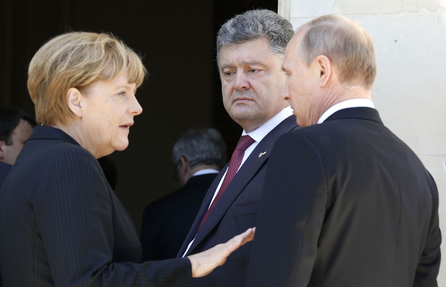 Ангела Меркель, Петр Порошенко и Владимир Путин.