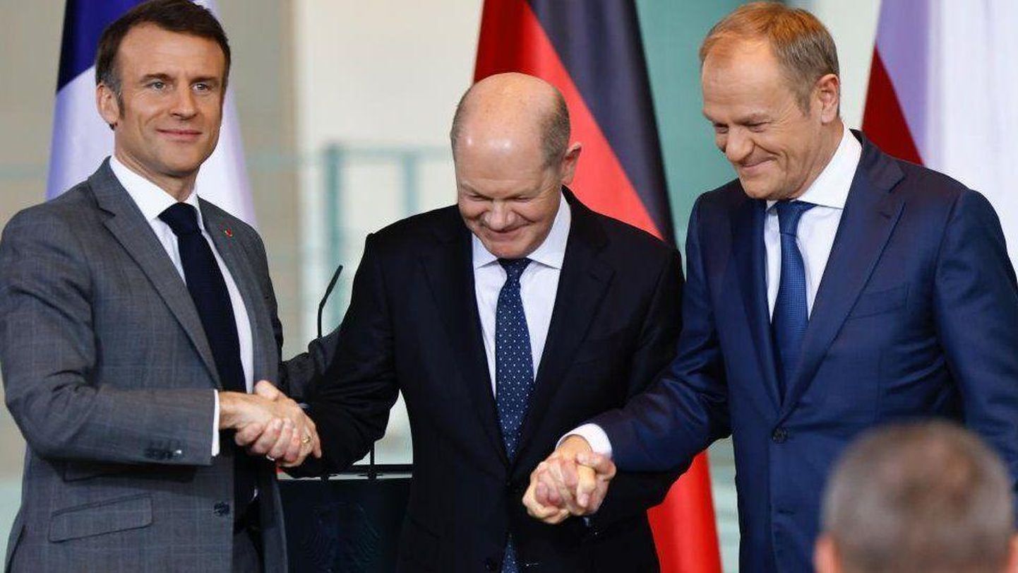 Недавно Туск (на фото - справа) встречался с лидерами Франции и Германии
