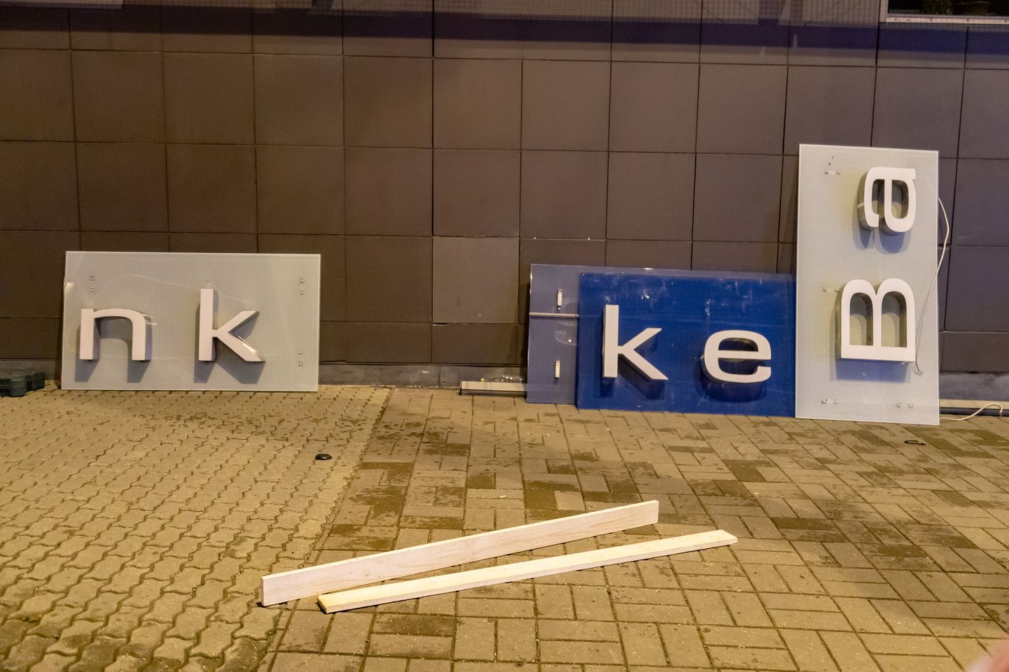 Signs coming off Danske Bank building in Tallinn