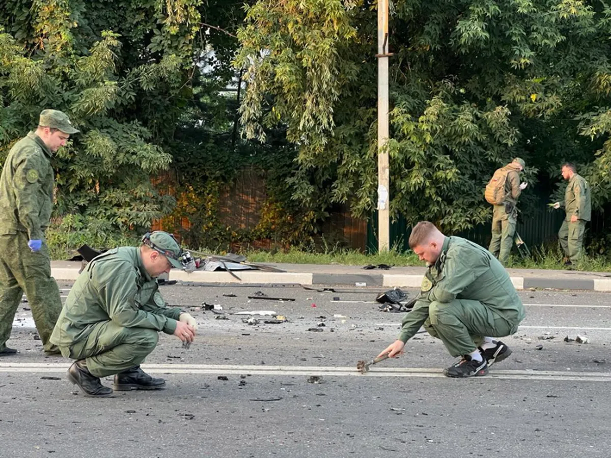 Russian investigators working at the scene of a car explosion on Mozhaisk highway near the village of Bolshiye Vyazemi in the Odintsovo urban district in Moscow region, Russia. In the evening of 20 August, 2022, a Toyota Land Cruiser car blew up when the car was moving at full speed on a highway, and then burned. The driver, journalist and political scientist Darya Dugina, the daughter of the philosopher Alexander Dugin, died on the spot.