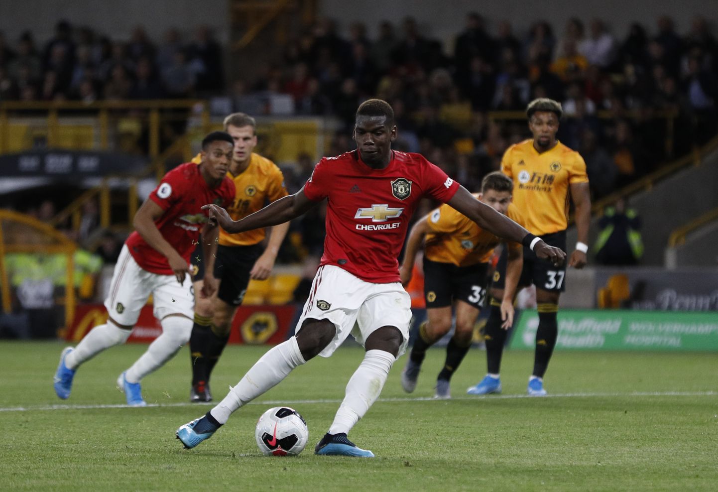 Paul Pogba of Manchester United takes a penalty kick which is saved  during the Premier League match at Molineux, Wolverhampton. Picture date: 19th August 2019. Picture credit should read: Darren Staples/Sportimage via PA Images