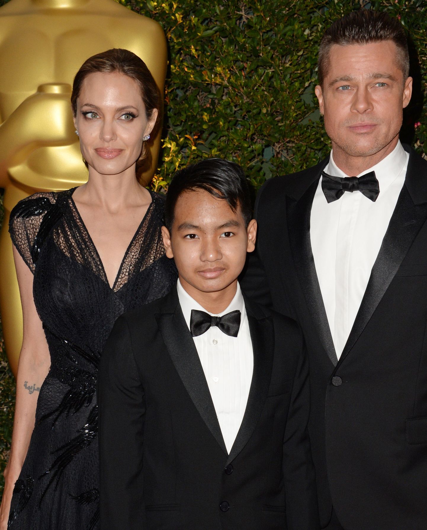 Angelina Jolie, Maddox Jolie-Pitt, Brad Pitt