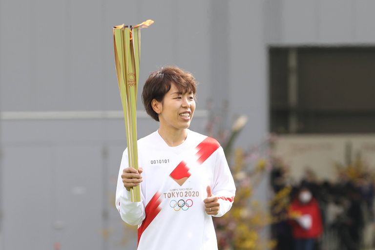 210325 -- FUKUSHIMA, March 25, 2021 -- Iwashimizu Azusa, a member of Nadeshiko Japan , the Japan women s National Football Team, runs as torchbearers in the first leg of the torch relay for Tokyo Olympic Games, Olympische Spiele, Olympia, OS at J-Village National Training Center in Futaba, Fukushima of Japan, on March 25, 2021.  SPJAPAN-FUKUSHIMA-TOKYO 2020-TORCH-RELAY DuxXiaoyi PUBLICATIONxNOTxINxCHN
