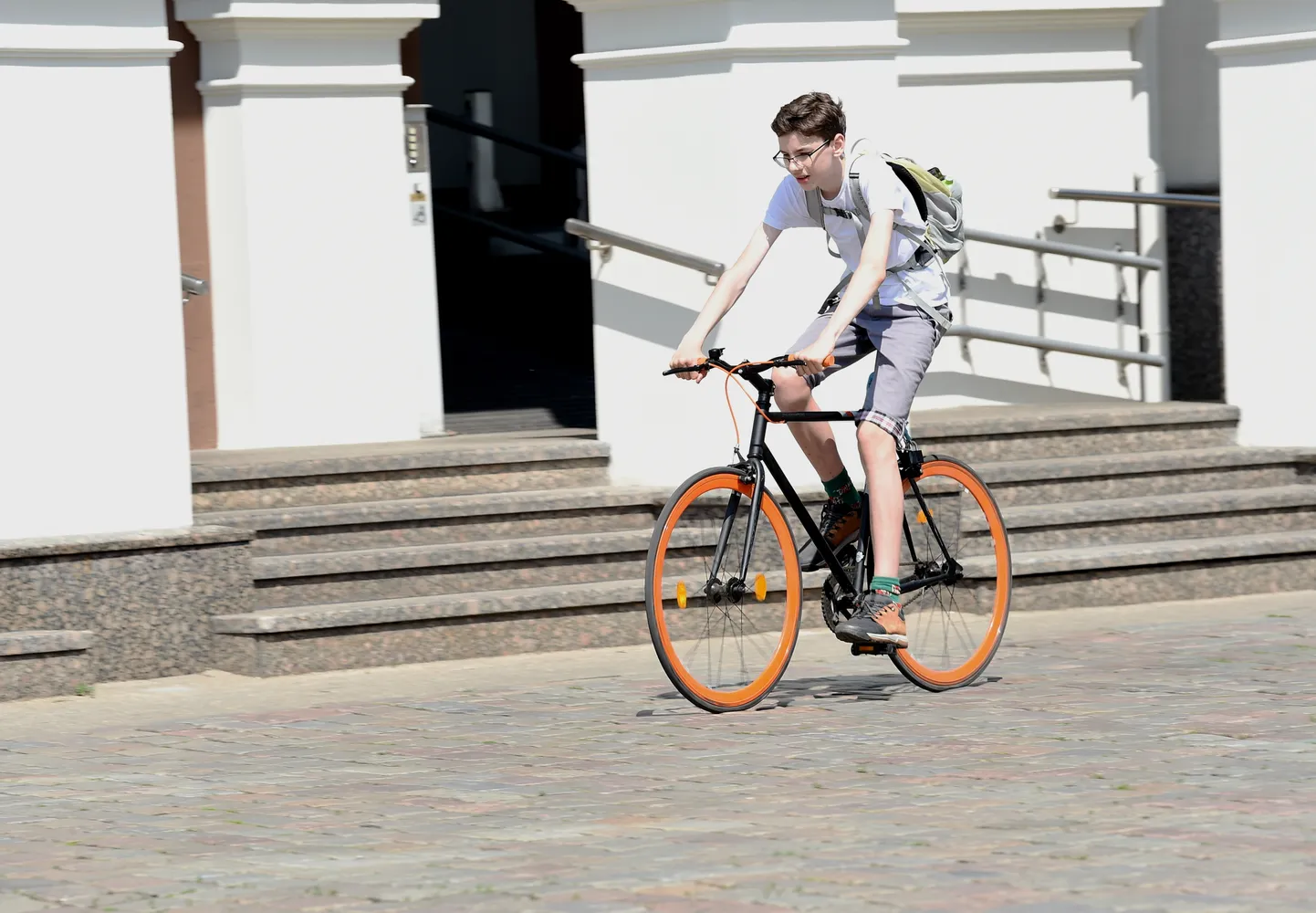 Velosipēdists Rātslaukumā.