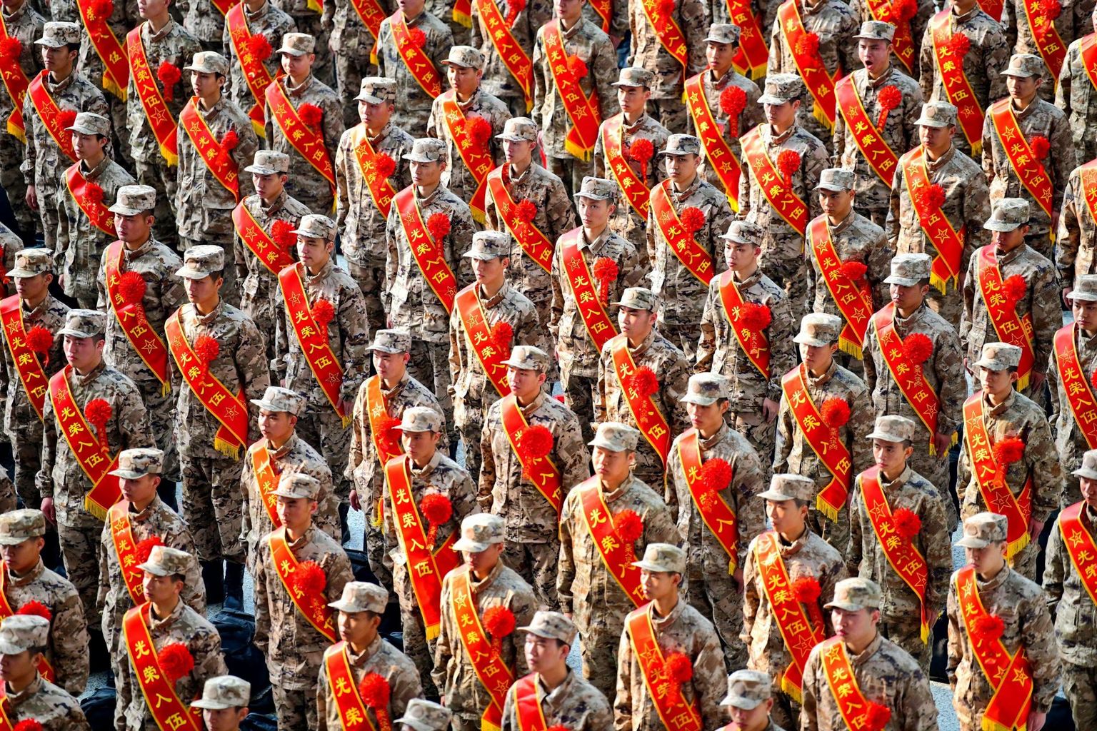 Uued Hiina Rahvavabastusarmeesse värvatud sõdurid osalemas tänavu 16. märtsil n-ö lahkumistseremoonial Ganzhou raudteejaamas. 