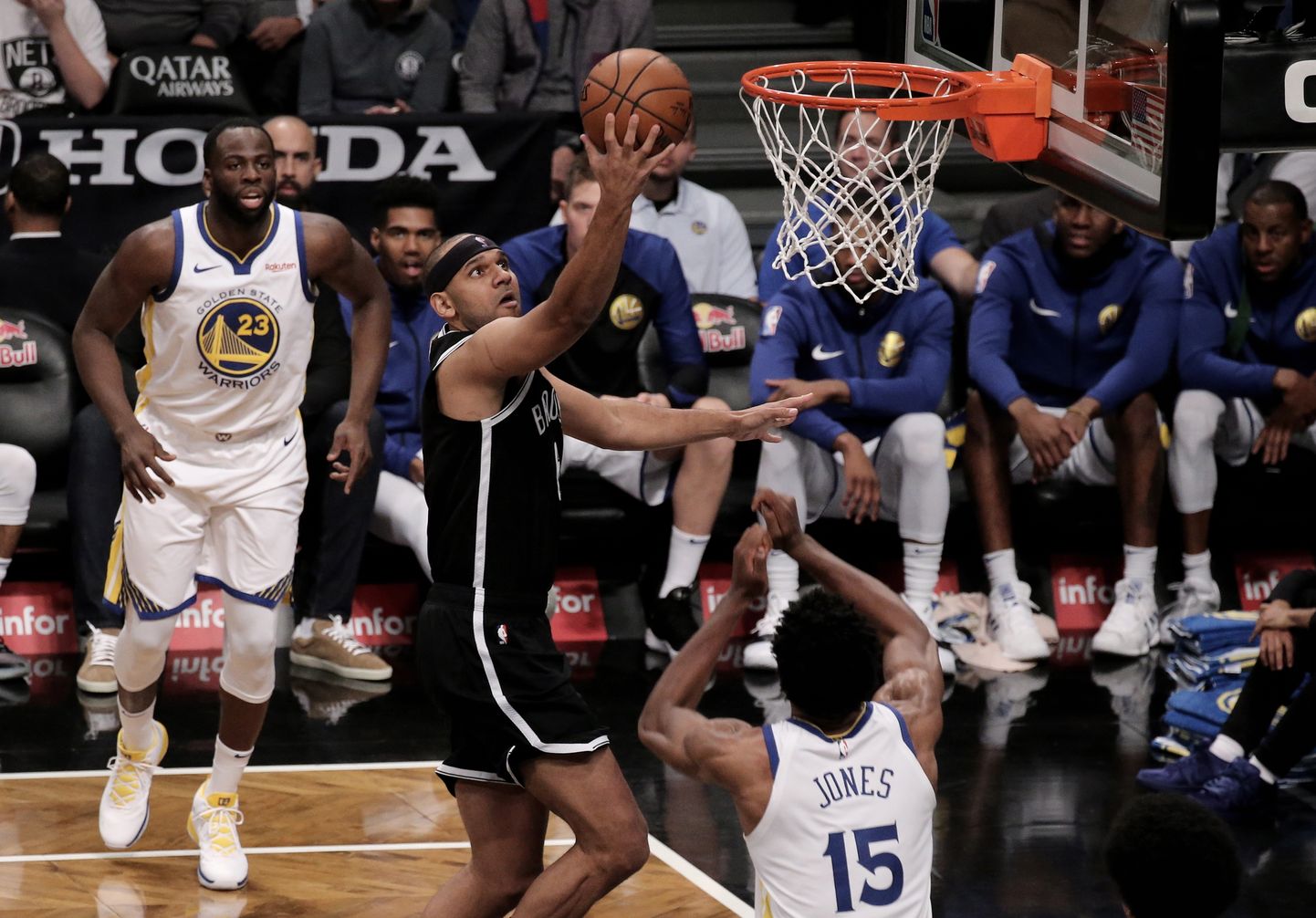 Brooklyn Nets' forward jared Dudley (C) shoots over Golden State Warriors guard Damon Jones (R) in the second half of their NBA basketball at Barclays Center in Brooklyn, New York, USA, 28 October 2018.  EPA/PETER FOLEY SHUTTERSTOCK OUT