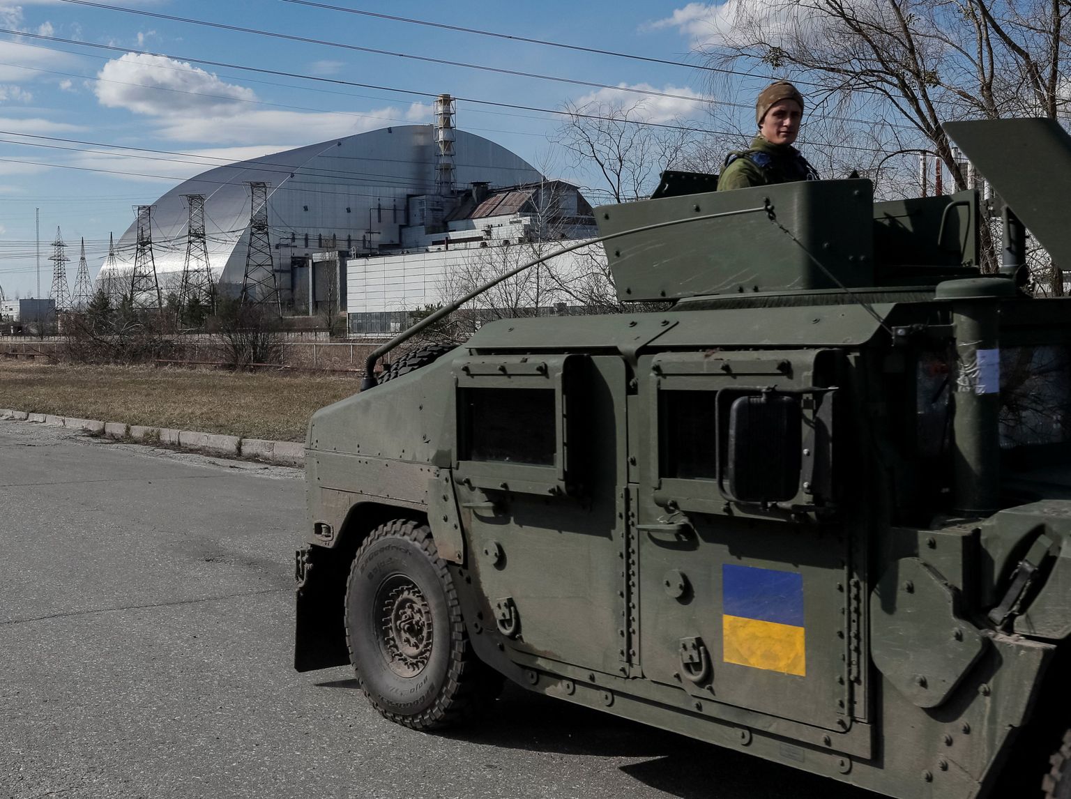 Ukraina rahvuskaardi sõdurid patrullimas Tšornobõli tuumajaama juures. Foto on tehtud 7. aprillil 2022