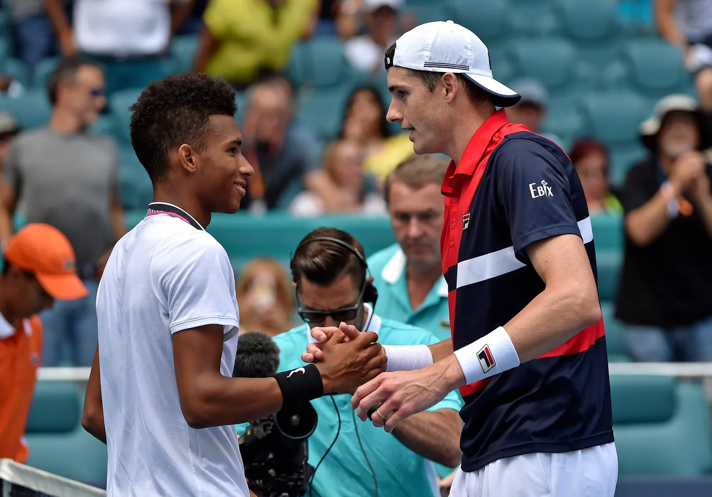 John Isner (paremal) alistas Miami turniiri poolfinaalis kanadalase Felix Auger Alissime`i 7:6 ja 7:6
