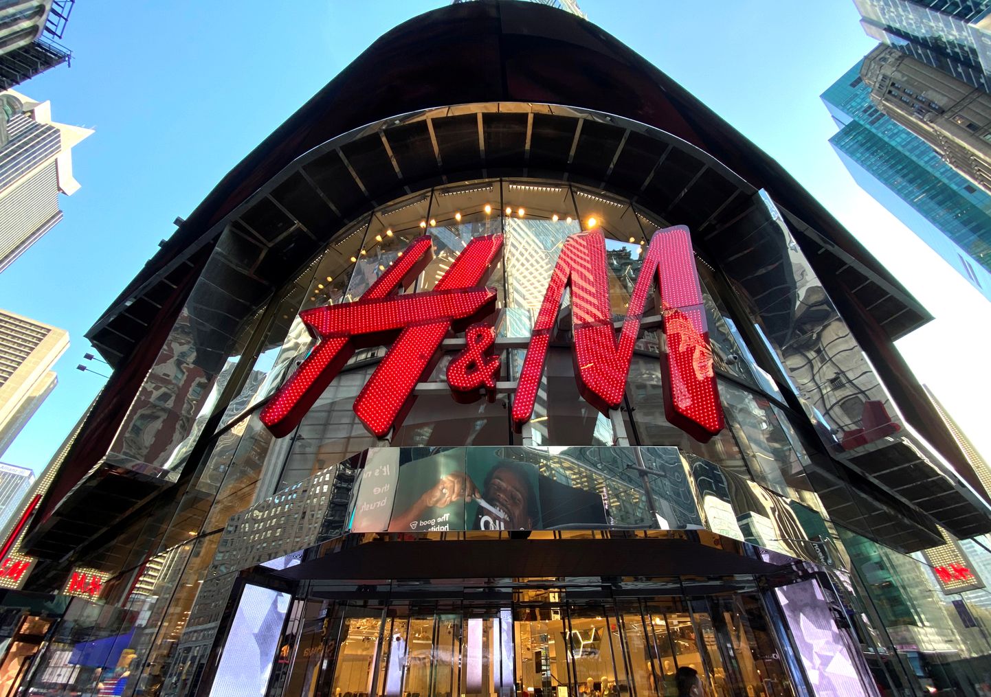 FILE PHOTO: The H&M clothing store is seen in Times Square in Manhattan, New York, U.S., November 15, 2019. REUTERS/Mike Segar/File Photo  GLOBAL BUSINESS WEEK AHEAD