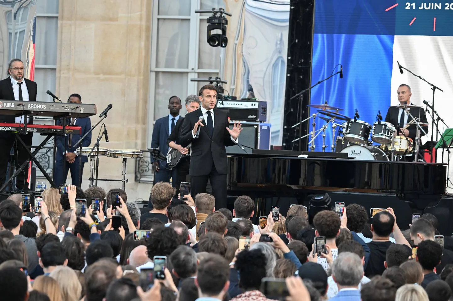 French President Emmanuel Macron pictured during the annual "Fete de la musique" one-day music festival in the courtyard of the Elysee presidential palace in Paris, France on June 21, 2024. Photo by Jacques Witt/Pool/ABACAPRESS.COM