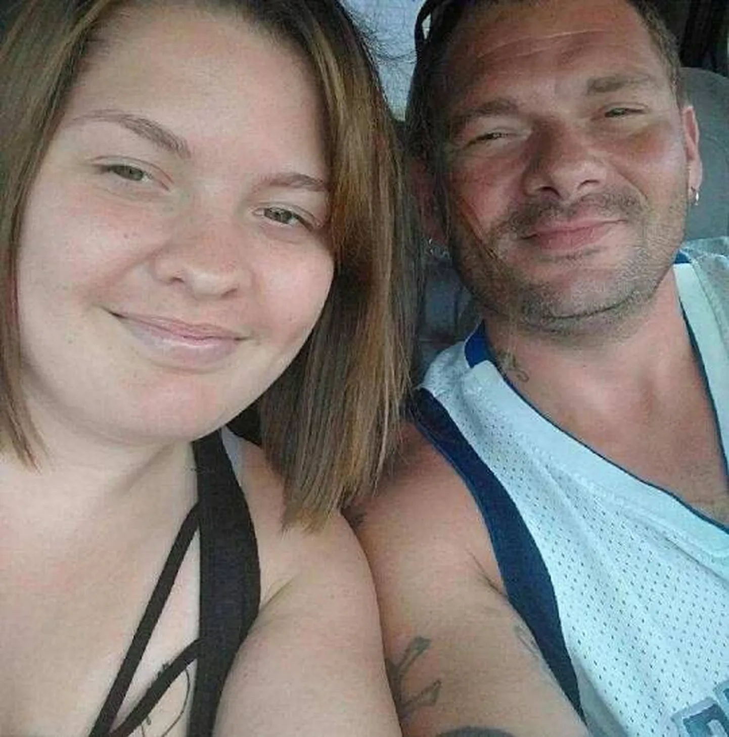 Samantha koos oma isa/abikaasa Travisega