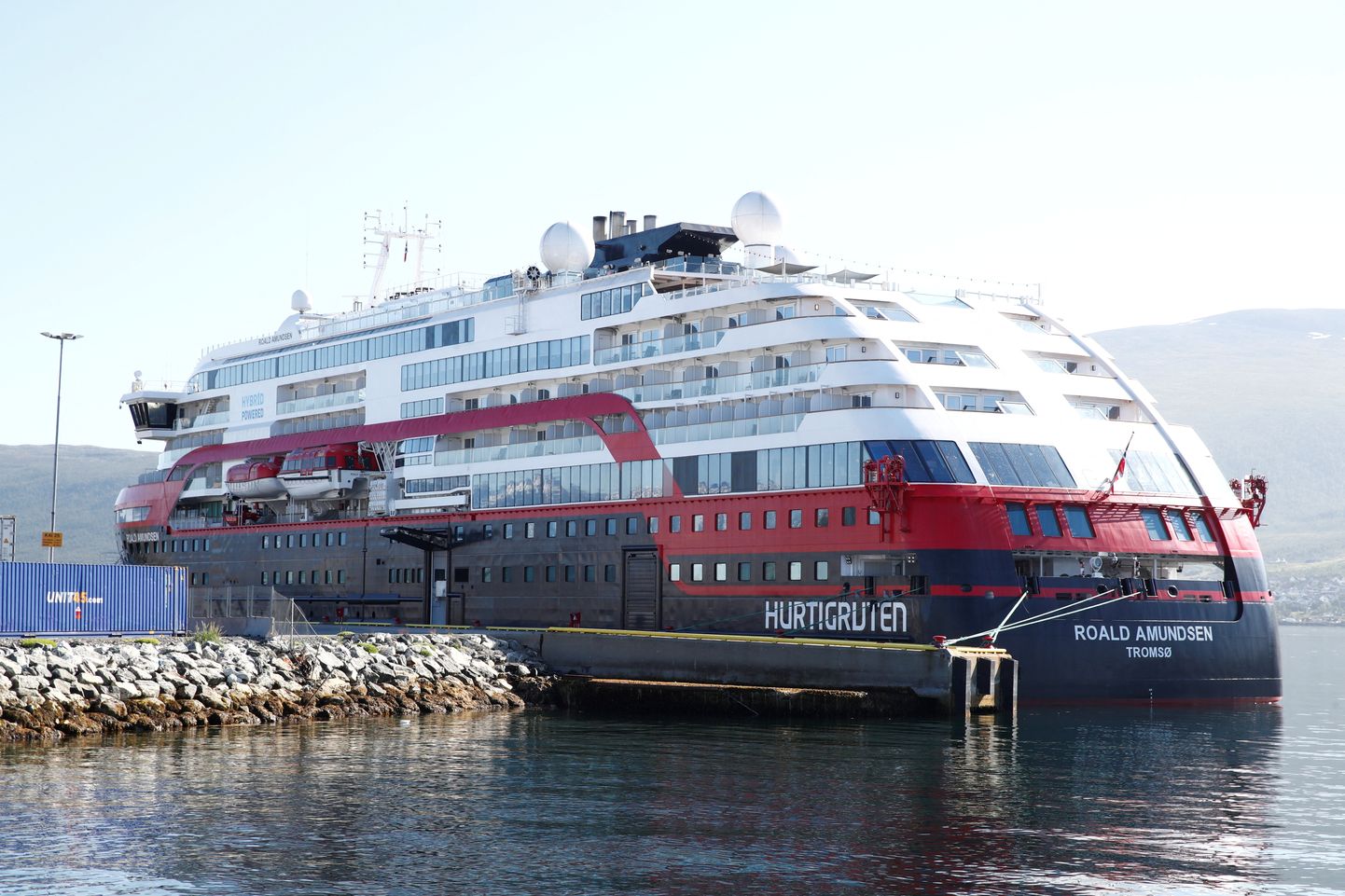 FILE PHOTO: The Hurtigruten cruise liner MS Roald Amundsen is moored due the coronavirus disease (COVID-19) outbreak on board, in Breivika, Tromso, Norway August 3, 2020. Terje Pedersen/NTB Scanpix/via REUTERS   ATTENTION EDITORS - THIS IMAGE WAS PROVIDED BY A THIRD PARTY. NORWAY OUT. NO COMMERCIAL OR EDITORIAL SALES IN NORWAY./File Photo