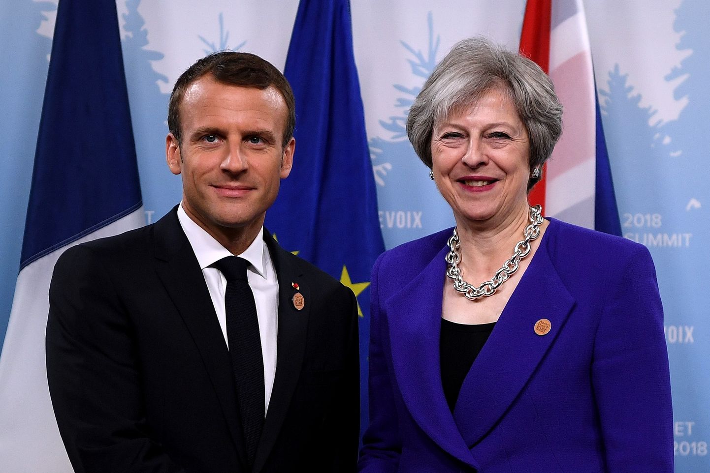Emmanuel Macron ja Theresa May.