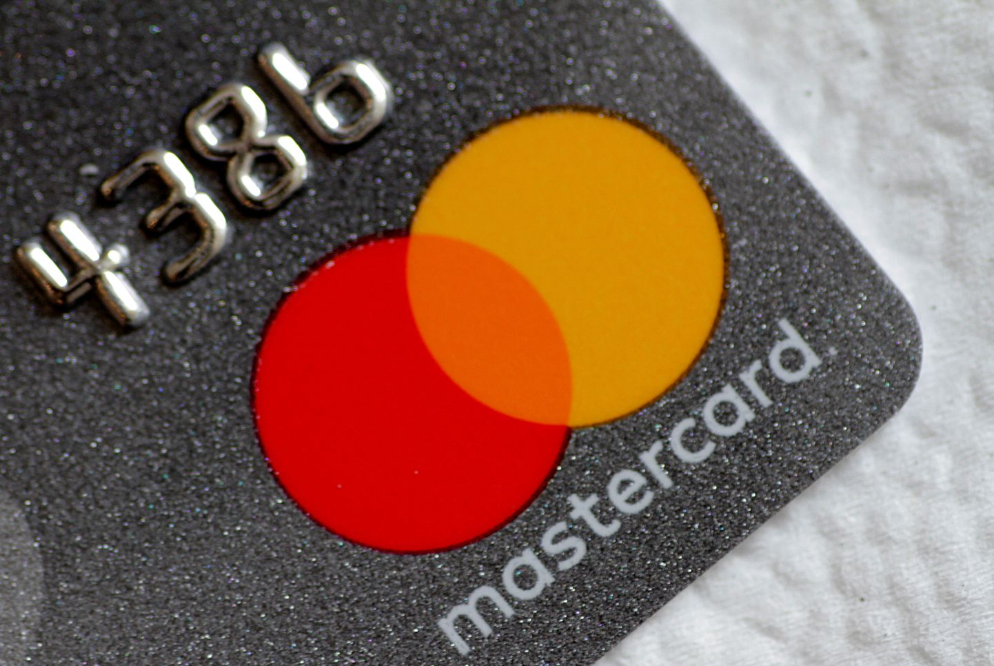 A Mastercard logo is seen on a credit card in this picture illustration August 30, 2017.   REUTERS/Thomas White/Illustration