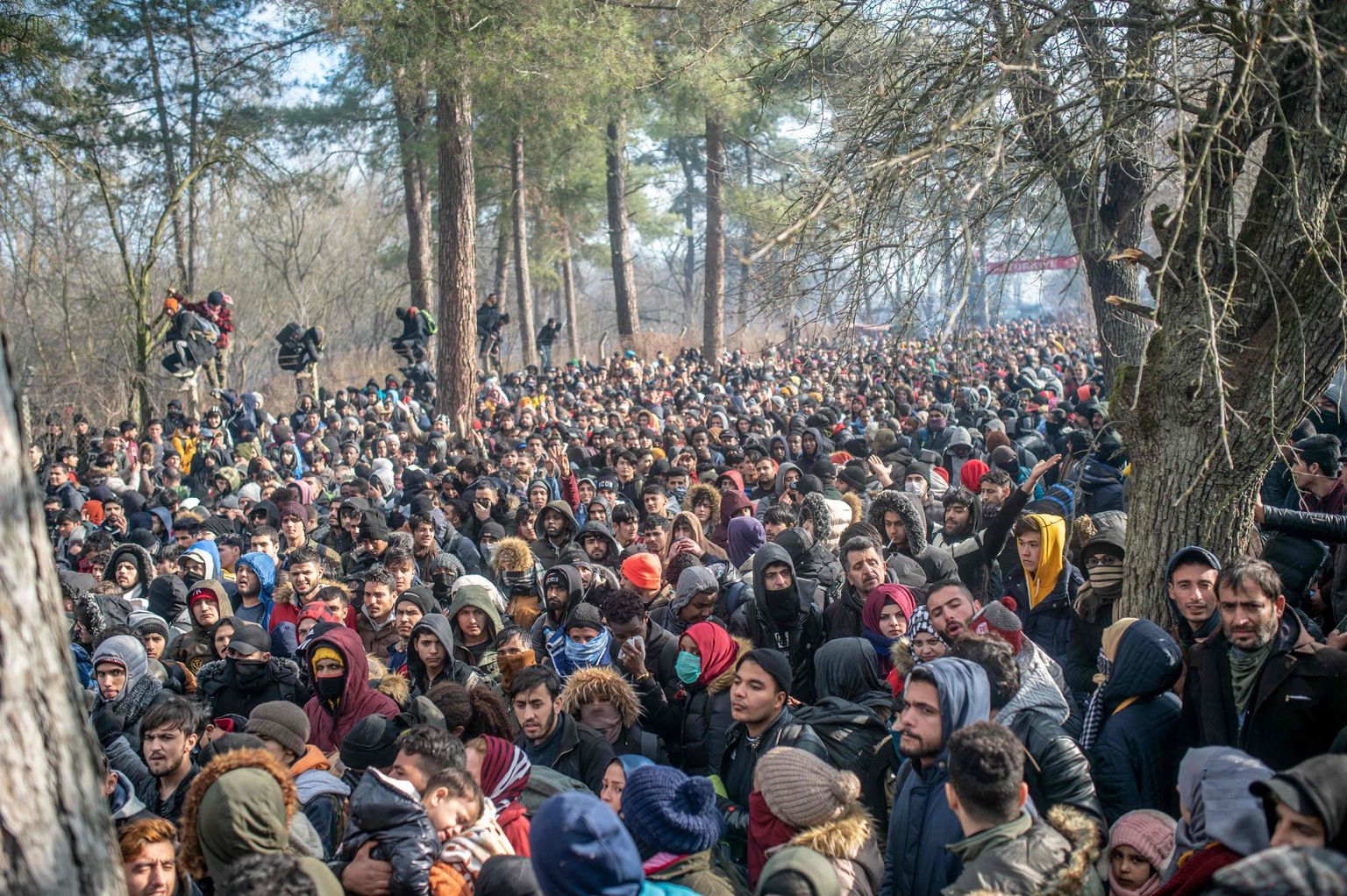 Nelegālie imigranti pie Turcijas-Grieķijas robežas.