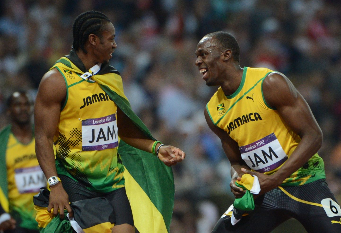 Jamaica sprinditähed Usain Bolt (paremal) ja Yohan Blake (vasakul) rõõmustamas Londoni olümpiamängude kuldmedalivõidu üle 4 x 100 meetri teatejooksus 2012. aastal.