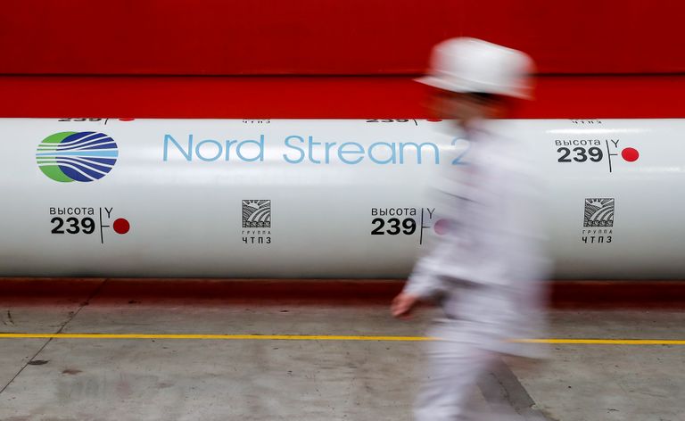 FILE PHOTO: The logo of the Nord Stream 2 gas pipeline project is seen on a large diameter pipe at Chelyabinsk Pipe Rolling Plant owned by ChelPipe Group in Chelyabinsk, Russia February 26, 2020. Picture taken February 26, 2020. REUTERS/Maxim Shemetov//File Photo