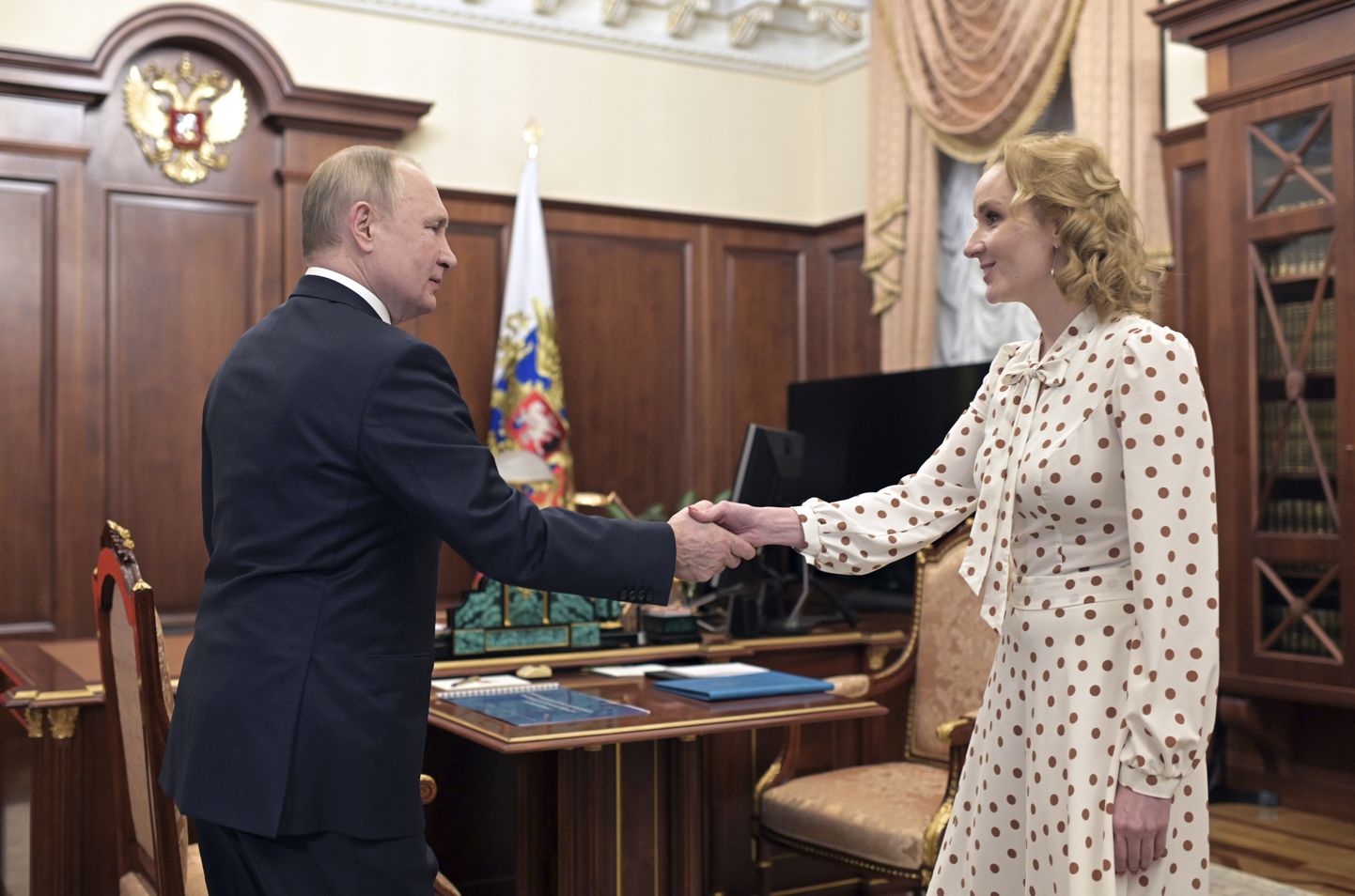 Vladimir Putin ja Maria Lvova-Belova.