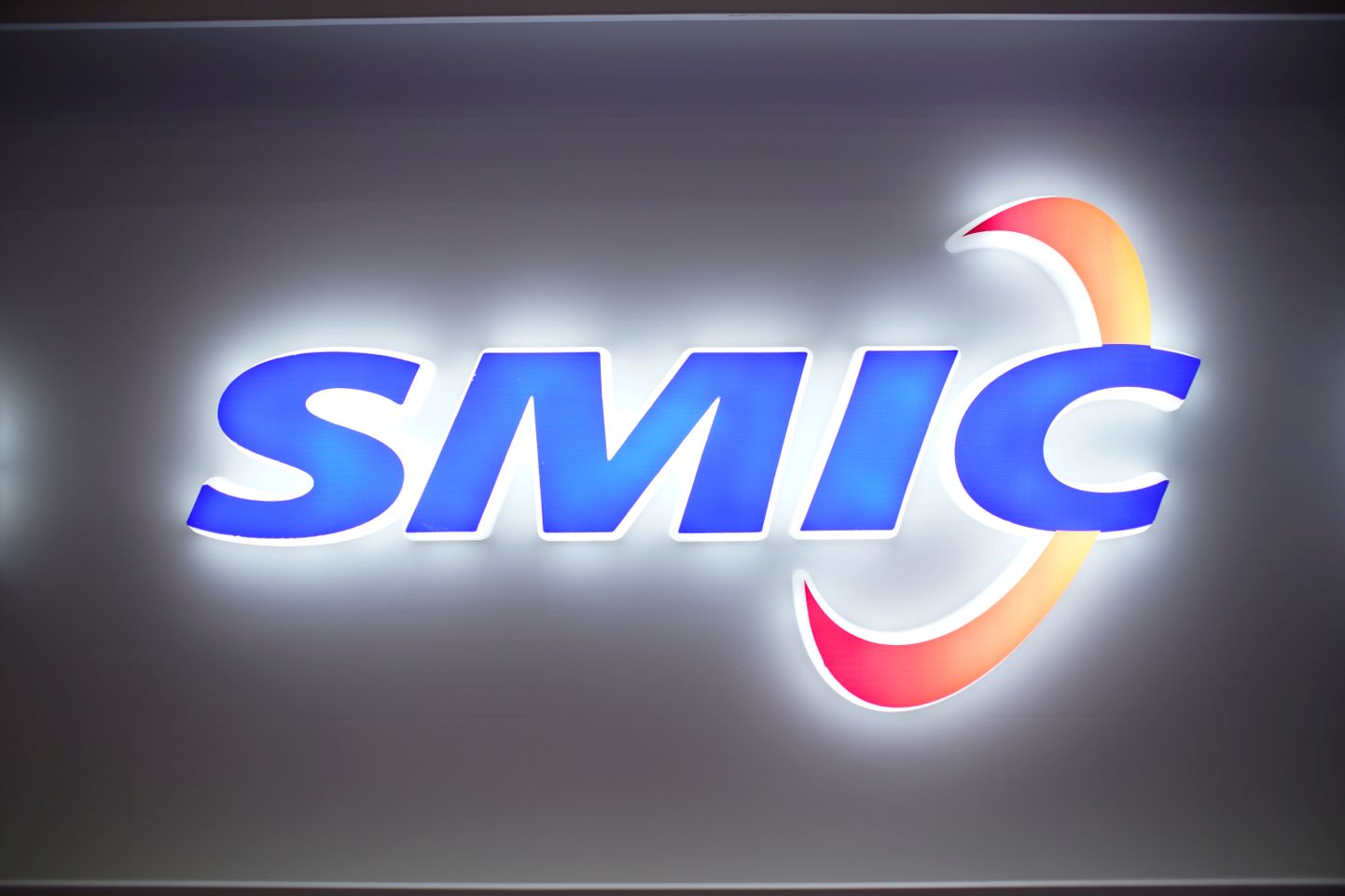 Semiconductor Manufacturing International Corpi (SMIC) logo.