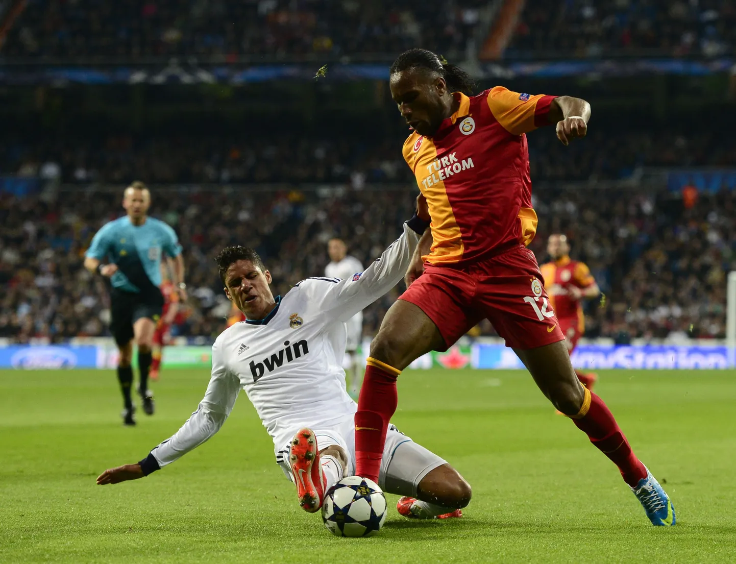 Raphaël Varane ja Didier Drogba
