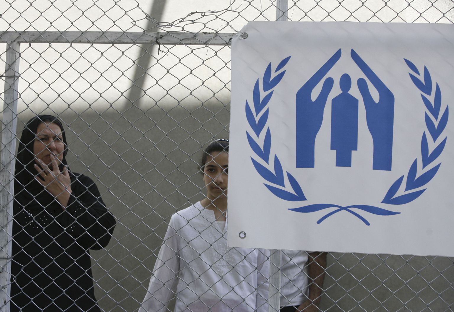 UNHCR logo (tagaplaanil iraaklastest pere)