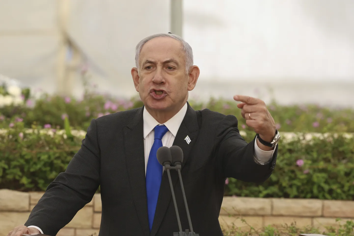 Israeli Prime Minister Benjamin Netanyahu speaks during a ceremony at the Nahalat Yitshak Cemetery in Tel Aviv, Israel, Tuesday, June 18, 2024. The ceremony marked the annual memorial for people killed in Israel’s Altalena affair -- a violent clash between rival Jewish forces that nearly pushed the newly independent Israel into civil war in 1948. (Shall Golan/Pool Photo via AP)  NYWS201