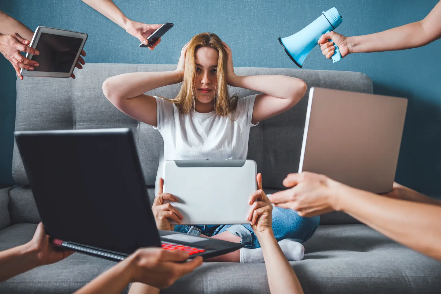 Informational digital detox. Fake news. A girl in stress and anxiety of depression closed her ears.